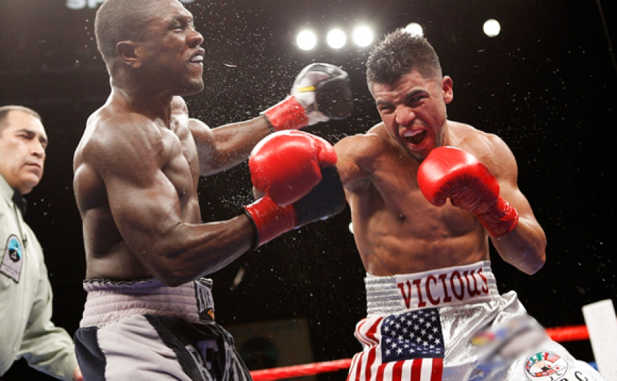 Ortiz landing punch in his first fight against Berto