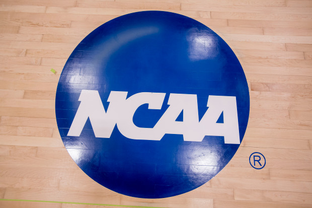 NCAA logo on the court