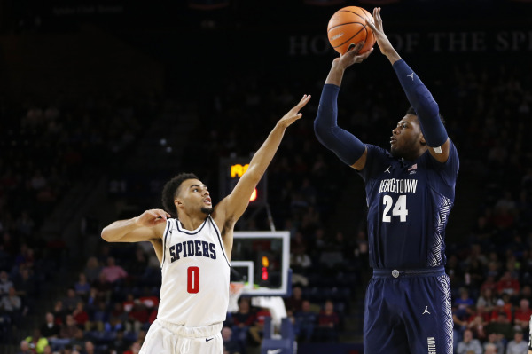 Georgetown Hoyas forward Marcus Derrickson (24) shoots the ball over Richmond Spiders guard Jacob Gilyard (0) during the second half at Robins Center. The Hoyas won 82-76.