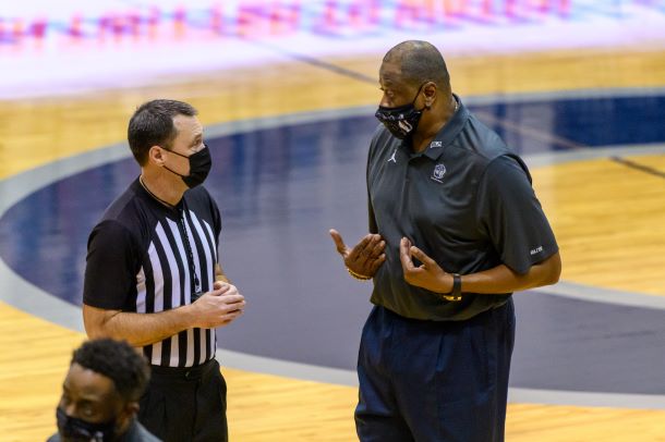 Patrick Ewing speaks to referee vs St. John's/Photo Credit: Rafael Suanes / Georgetown Athletics