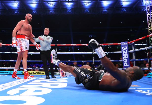 Tyson Fury knocks down Dillian Whyte Photo Credit: Mikey Williams: Top Rank