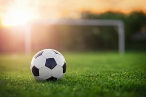 Soccer ball in the middle of a field