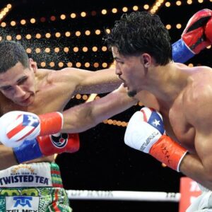 Xander Zayas lands punch against Jorge Garcia Perez (Photo Courtesy: Mikey Williams/Top Rank)